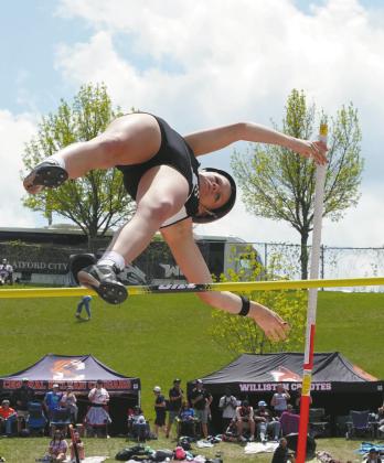 Senior Alyssa Hoyles places second in the pole vault at the Class B State Track Meet in Bismarck. Photo by Larry Stokke