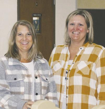Kristi Johnson and Jami Melland pictured at the day care they helped start. Photo by Andrea Johnston.