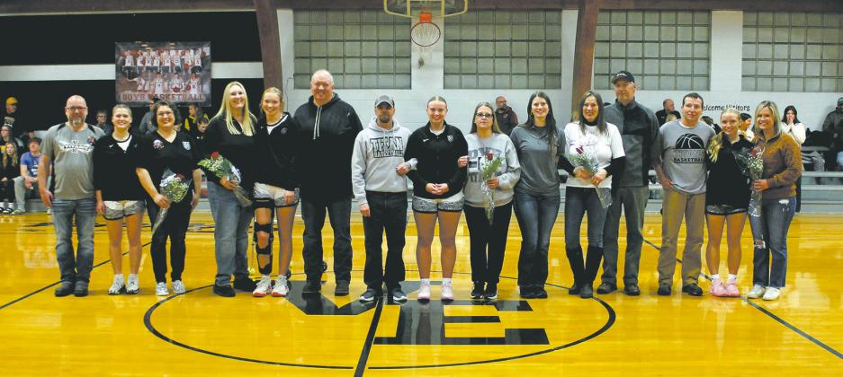 Together with their parents, seniors Greta Burrell, Easton Larson, Aleah Pokrzywinski, Hannah Myrdal, and Reese Fering were recognized on Senior Night before the game in Crystal Jan. 24. Photo by Jamie Rarick
