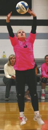 Claire Thompson puts up a set in action against Benson County.