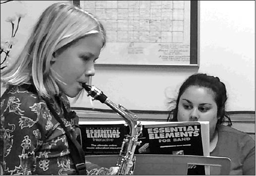 Alyssa Hoyles played her Saxophone accompanied by Drayton Public School music teacher Ms. Khaya Palada at the Drayton Area Community Foudation Social. Photo submitted by Drayton Area Community Foundation