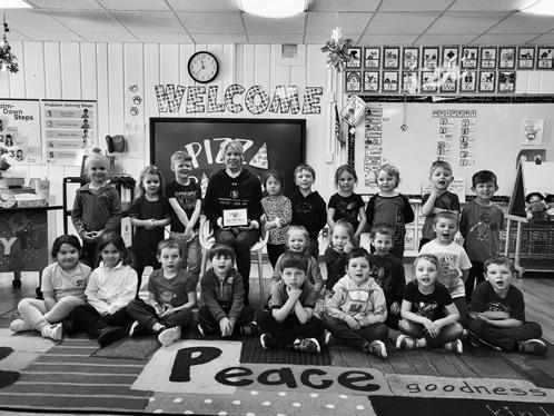 Hartz receives Teacher of the Month honors