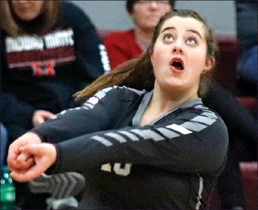 Hailey Hurtt bumps the ball across the net Monday night against the Mustangs. VNV Photo by Lesa Van Camp