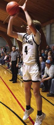 Charlie Kittelson tries a 3 pointer against Larimore.