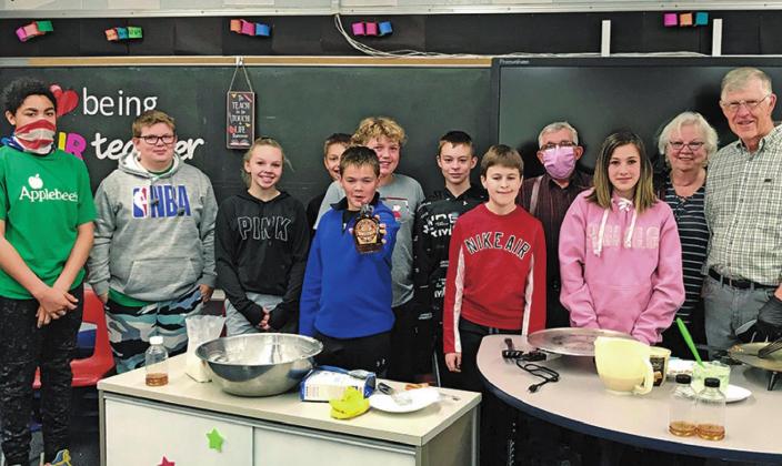 Sixth grade class samples sweet reward from their efforts
