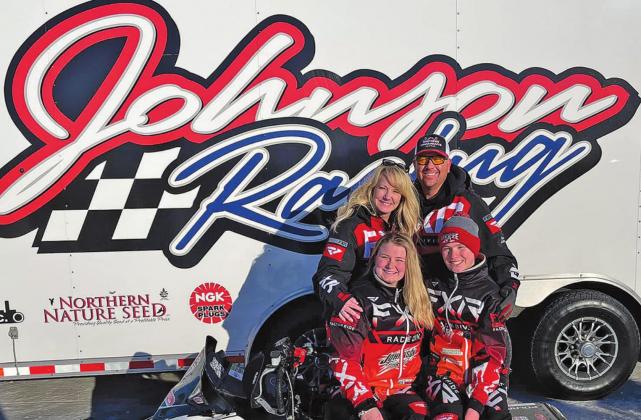 Johnson family in front of the Johnson Racing trailer. Pictured back row left to right: Amber and Scott Johnson. Front row: Madison Philips and Hunter Johnson. Photo submitted by Johnson Family