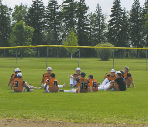 Coach Tyler McFarland talks to the team recapping Thursdays game against Minto. Photo by Rebecca Davis