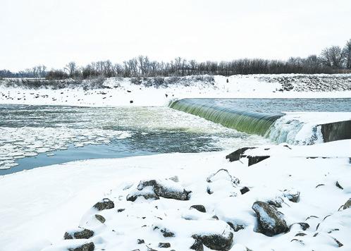 The outdated low head dam has a legacy of dangerous rolling currents far deeper than it appears. Photo by Hilary Nowatzki.