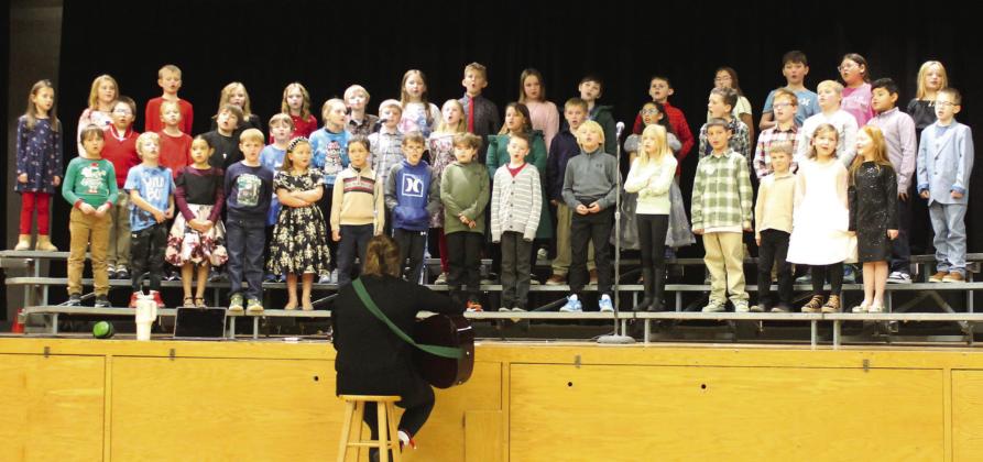 Students in grades one through four closed this year's winter program with 'We Wish You a Merry Christmas.' Photo by Jamie Rarick