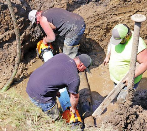 A new section of pipe was used to replace the old damaged section of water line on Friday afternoon. VNV Photo by Lesa Van Camp