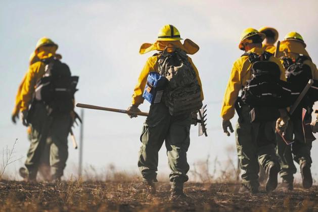 North Dakota National Guard soldiers and airmen work with the Department of Emergency Services to prevent the spread of a wildfire near Mandaree on Oct. 6, 2024. Gov. Kelly Armstrong declared a statewide fire emergency Aug. 7, 2026, due to drought conditions. (U.S. Army National Guard photo courtesy of Staff Sgt. Samuel J. Kroll)