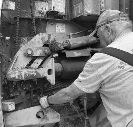 An infrared thermometer can alert farmers of dangerous temperature spikes at the bearings. NDSU photo