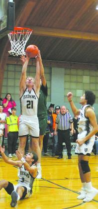 DVE's Carter Oberg comes down with the rebound. Photo by Jamie Rarick.