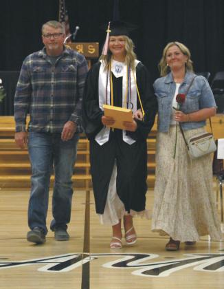 Alyvia Quibell leaving the ceremony as a new graduate of Drayton Public School. Photo by Andrea Johnston