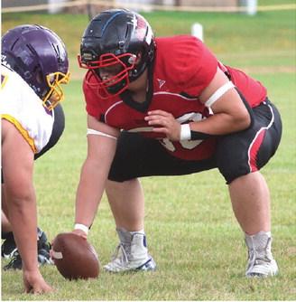 Bryce Wimpfheimer snaps the ball in action against New Town.