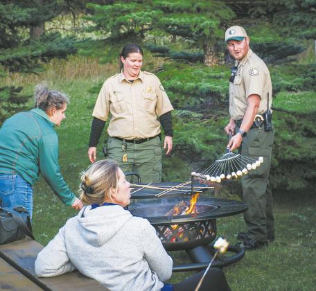 Hotdogs and marshmallows were roasted over an open fire with the help of Icelandic State Park rangers. Photo by Krystal Wilson of Drayton.