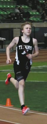 Benedict Burrell ran the 2nd leg of the boy’s 4x600 relay. They took 5th place. Photo by Jamie Rarick