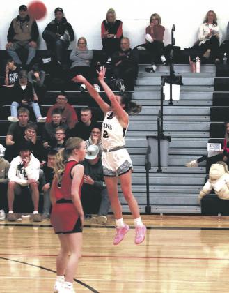 DVE junior Jaelyn Johnson goes for three. Photo by Jamie Rarick