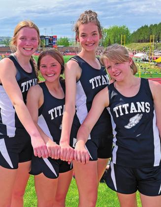 The girls 4 x 400 relay team finish off their season with a personal record. Pictured left to right: Easton Larson, Jayce Nelson, Elizabeth Fedje, and Alyssa Hoyles. Photo provided by Drayton Public School