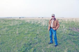 Divide County resident Jody Gunlock stands in one of his cow pastures just four miles from the Canadian border and downwind of the existing Boundary Dam power plant, which is located between the U.S. border and Estevan, Saskatchewan. Gunlock also currently serves as Divide County’s zoning officer and emergency manager. Photo by Brad Nygaard, The Journal, Crosby.