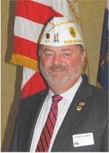 Department Commander Clarence L. Carroll III of Larimore Post 97.