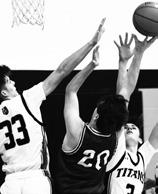 Calvin Otto looks for an open teammate in action against Hatton-Northwood. Photo by Lyle Van Camp.