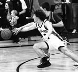 Logan Wieler fights a Thunder defender for control of the ball. Photo by Lyle Van Camp.