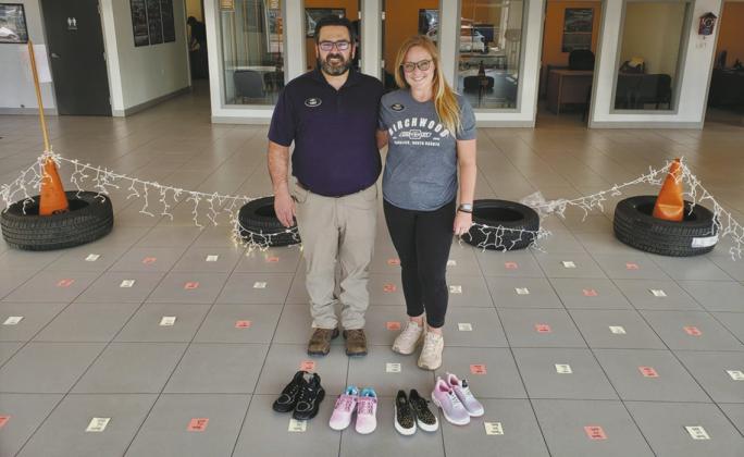Al &amp;amp; Chris Berry hope to have a “pair for every square” at the end of the shoe drive. Submitted photo