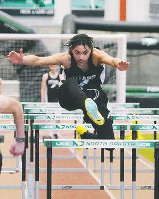 Mason Pollestad clearing a hurdle at last week's meet.