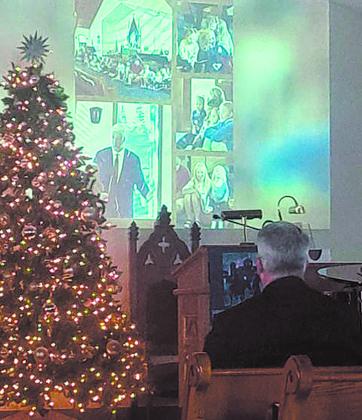A video slide show was presented in honor of Dryburgh. Images and music were selected by Kris Heine and they were assembled by Tracy Giles. Photo by Christine Jensen