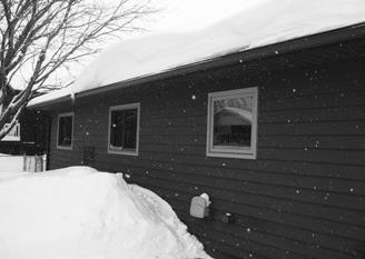 Most roofs are designed to handle the snow load of a typical winter. (NDSU photo)