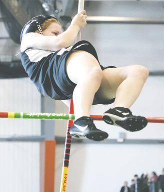 Alyssa Hoyles clears the bar in the girls pole vault. Photo by Lyle Van Camp.