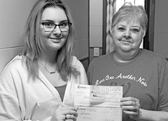 Pictured right to left: 4-H Jr. Leader Myah Jensen and L.O.A.N Board Member Lorna Ratchenski. Photo submitted