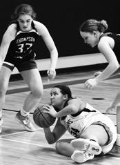 Hailey Berg looks for an open team mate. Photo by Lyle Van Camp.