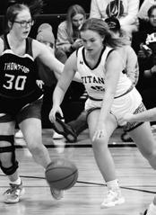 Aleah Pokrzywinski pushes the ball past Thompson's Jailin Avdem. Photo by Lyle Van Camp.