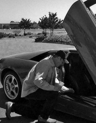 Christian mechanic Glenn Cassel checks out a Lamborghini.