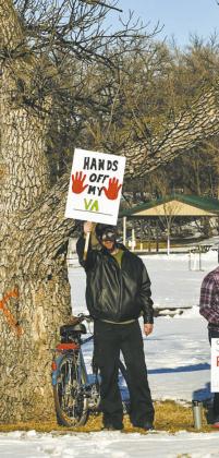 Locals voice support for veterans at a Hands Off protest near the Veterans Memorial Bridge between Fargo and Moorhead on April 5. Approximately 2,000 people attended the rally voicing opposition to a variety of actions of the new Trump administration. Photo Sabrina Halvorson, NDNC CEO.