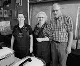 Amber Green, Marlys Boll, and Ron Boll working at the pancake breakfast. Photo by Ron Boll.