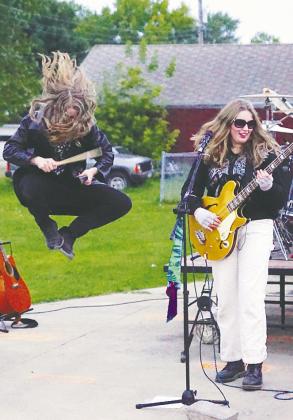 Ian Iverson airborne, as usual, while Anna Griedl shreds on the bass