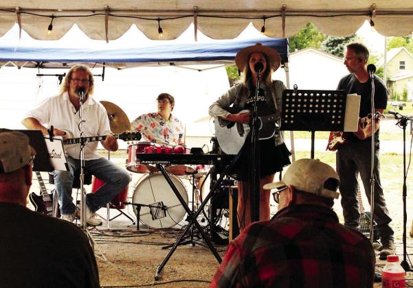 The Homestead Band provided live music outside the curling club on Friday. Photo by Jamie Rarick