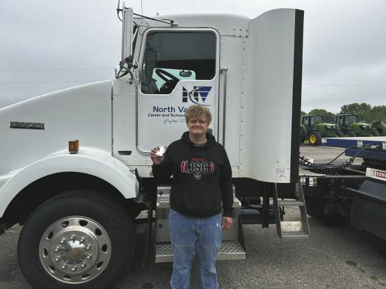 Bryce with his newly awarded license. Photo courtesy of North Valley in Grafton.