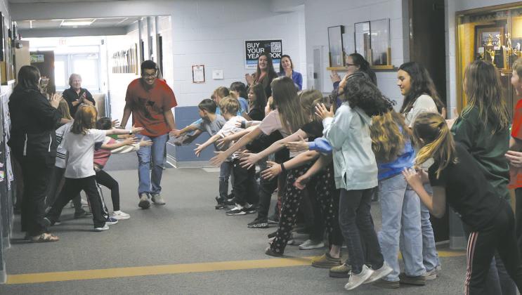 Jerimiah Johnson was sent off by his excited peers to the 2026 Cook Around the World competition. Photo by Rebecca Davis