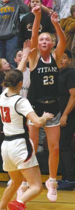 DVE's Peyton Larson gets the shot off over Cavalier defender Shirley Kemp. Photo by Jamie Rarick