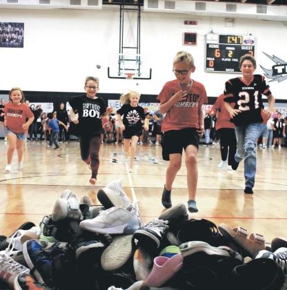 Elementary students got in on the homecoming fun with a shoe relay as part of Friday’s homecoming games. Photo by Jamie Rarick.