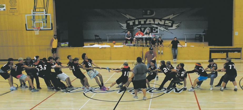 Junior high football players took on the varsity team for tug-of-war during Friday’s pep rally in the gym. Photo by Jamie Rarick.