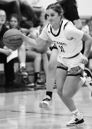 Jacey Nelson brings the ball up the court in action at Edinburg Thursday evening. Photo by Lyle Van Camp.