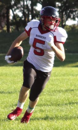 Grant Vold runs the ball in action at Center Stanton. Photo provided by Drayton Public School.
