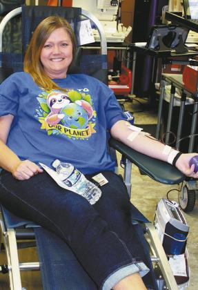 DPS staff member Angi Aasand was one of many caring donors at last week’s blood drive at the school. Photo by Jamie Rarick.