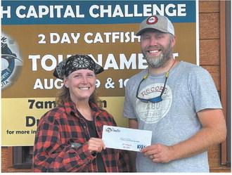 Second place winners May Thompson of East Grand Forks (left) and Jayson Ackerson, West Fargo. Photo by Andrea Johnston