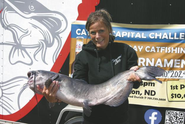 Anna Sjol from East Grand Forks won day one’s biggest fish prize with a 22.63 pound catfish. Submitted photo.